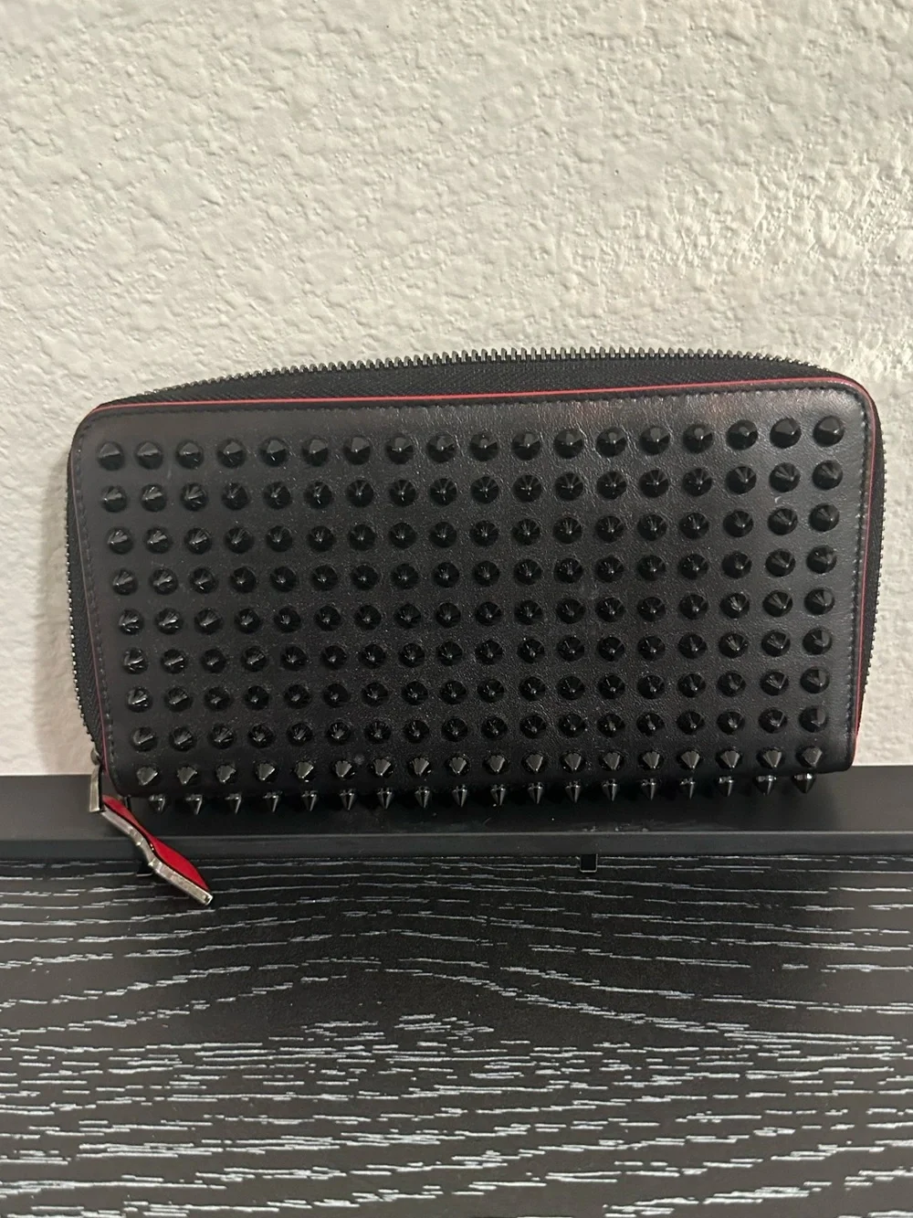 Black Studded Zip-Around Wallet with Red Trim